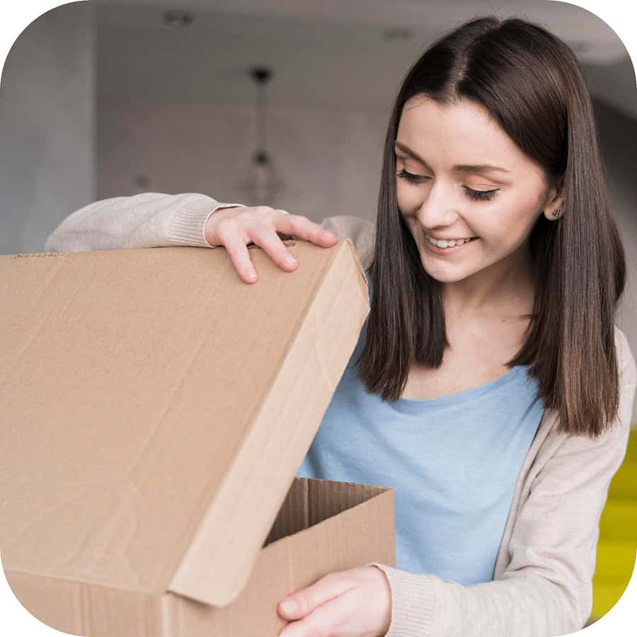 Woman opening a package